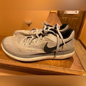 Grey and Black Nike size 5 sneakers